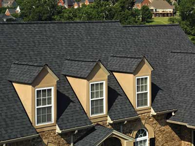 Residential home with black CertainTeed shingles on its roof