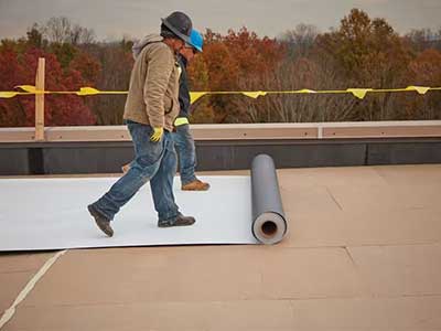 Top view of a flat, white commercial roof